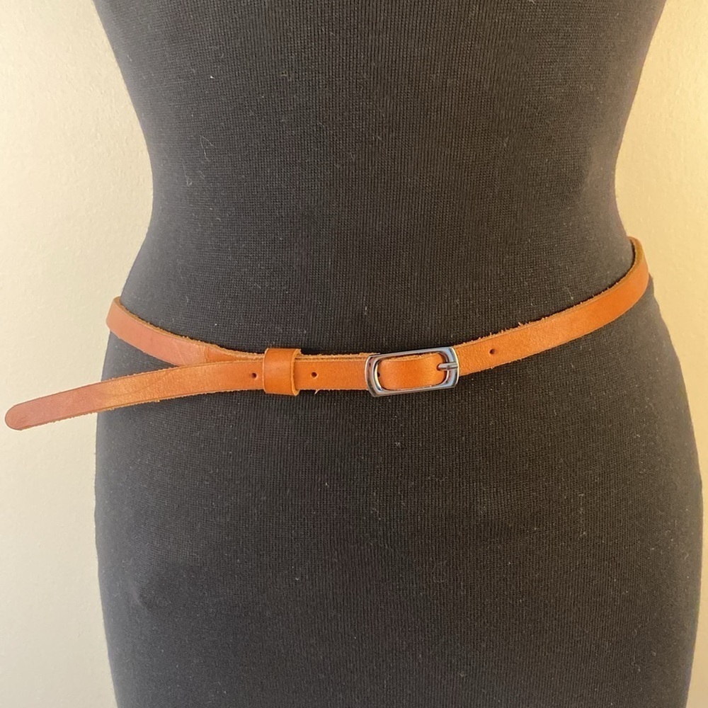 Brown skinny leather belt, approximately 41” long